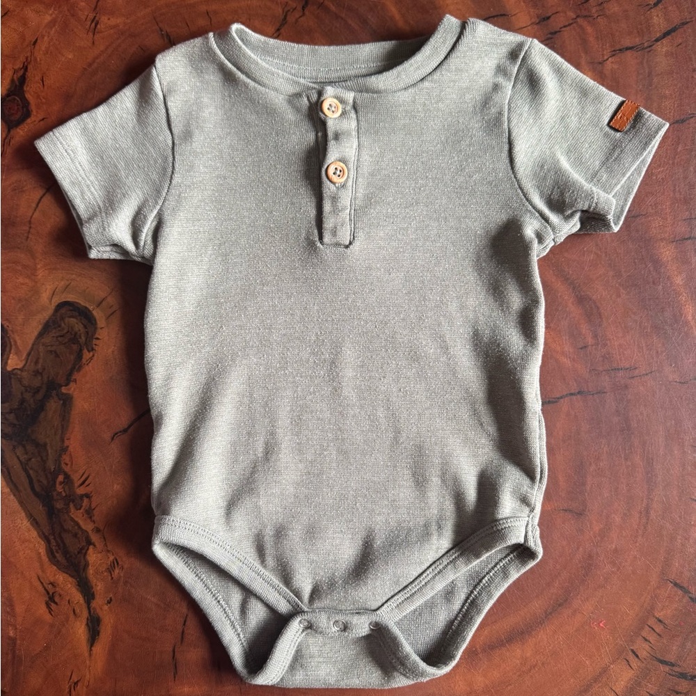 7 For All Mankind Onesie